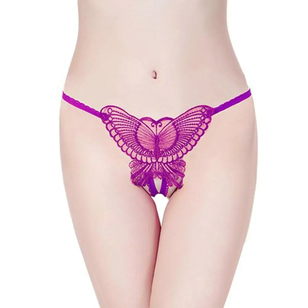 Purple butterfly lace lingerie on a woman's hips.